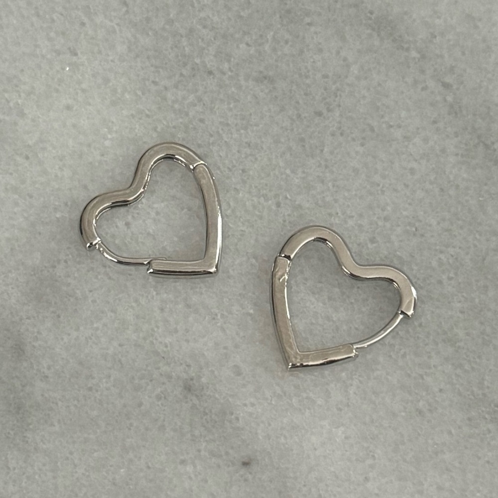 COPY - Silver Heart Shaped Huggie Hoop Earrings Brand New

Brand New